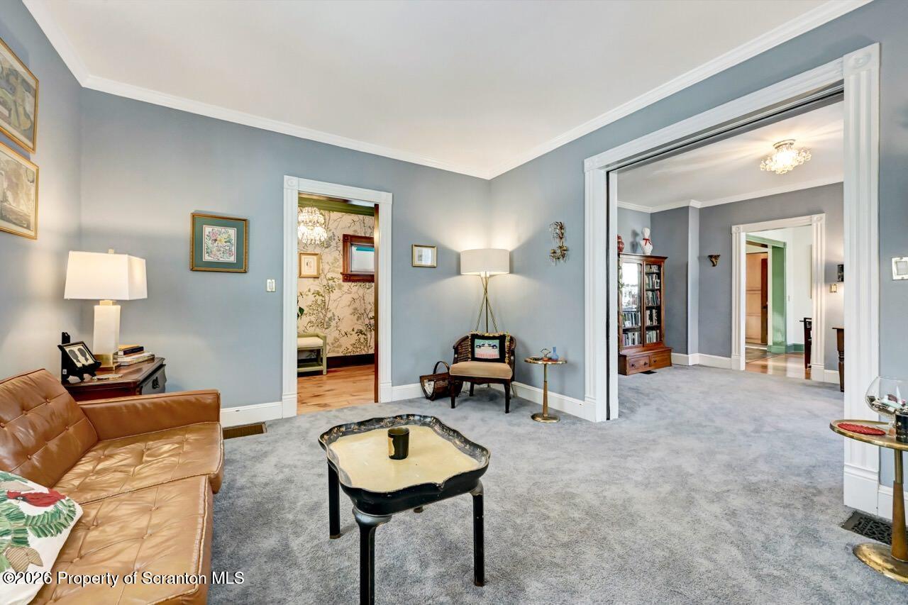 902 Columbia Street Scranton, PA 18509 - Photo 10 of 66 a living room with furniture and a wooden floor