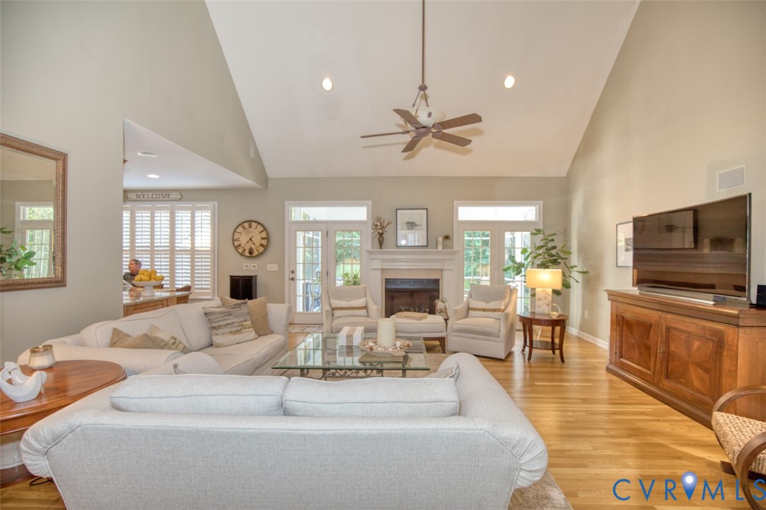 9960 Mill Pond Road Toano, VA 23168 - Photo 14 of 42 Vaulted ceiling with a ceiling fan, wood-finish fl