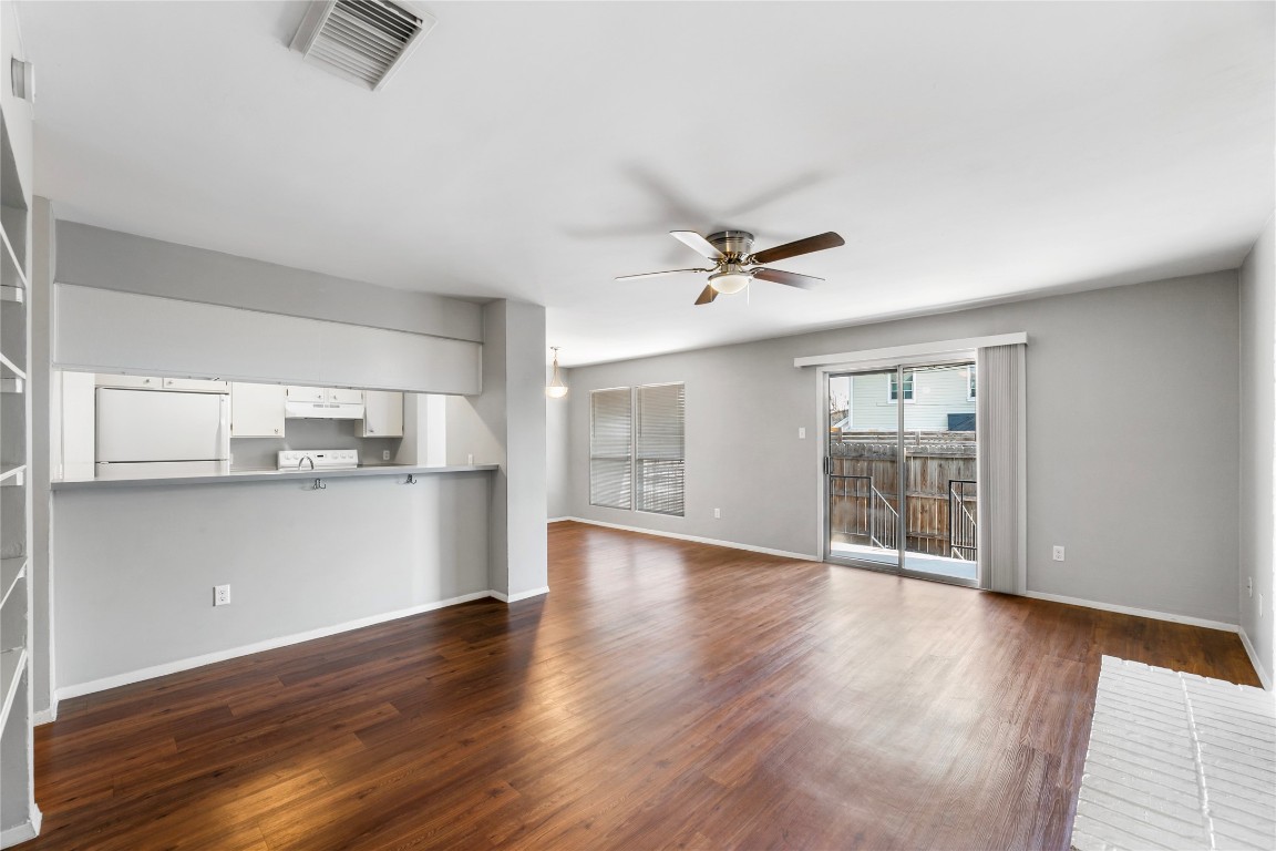 4304 Acropolis Court, Unit B Austin, TX 78759 - Photo 2 of 22 a view of a kitchen with wooden floor and electronic appliances
