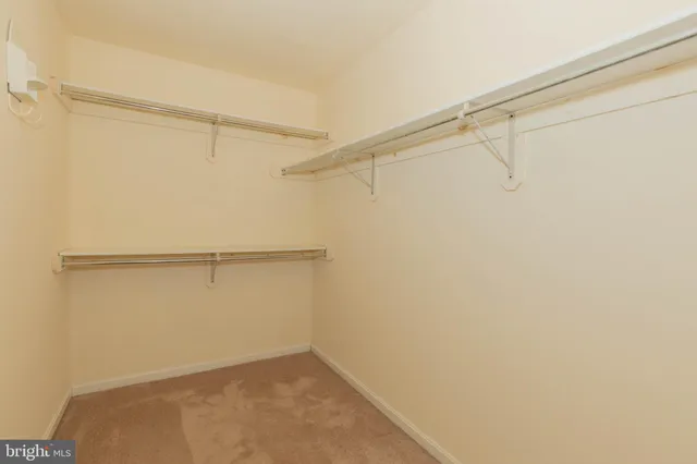 a view of a hallway with entryway