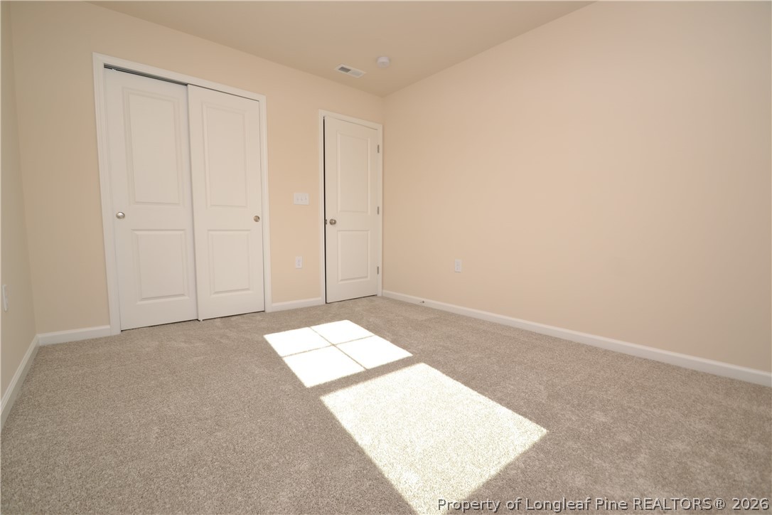 5703 Preveza Place Raleigh, NC 27603 - Photo 21 of 33 a view of an empty room