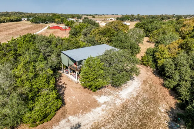 a view of backyard with green space