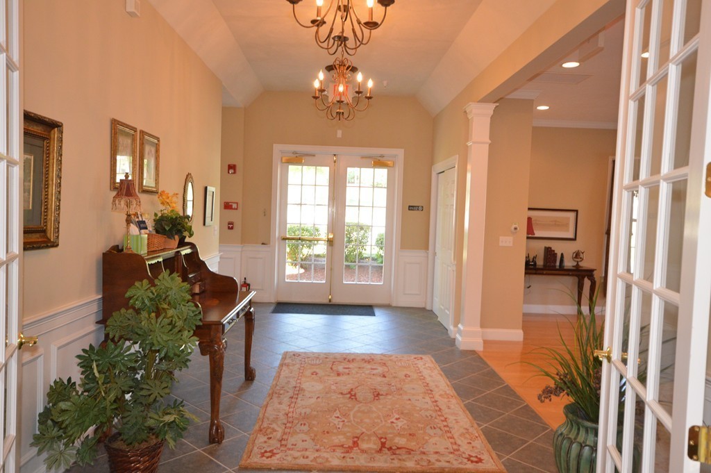 704 Autumn Ridge Drive, Unit 704 Ayer, MA 01432 - Photo 23 of 30 a very nice looking room with a large window