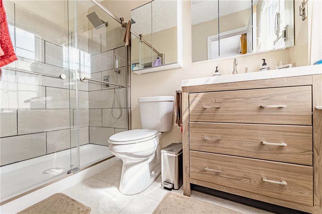 120 Lockheed Drive Coraopolis, PA 15108 - Photo 16 of 31 a bathroom with a sink a toilet and shower