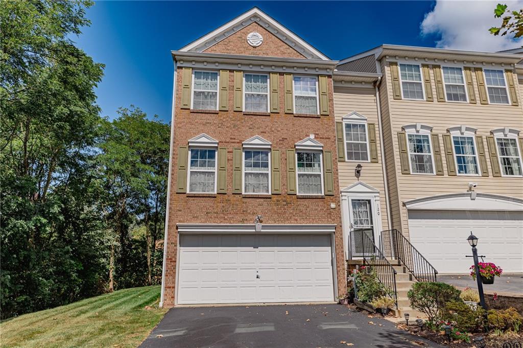 120 Lockheed Drive Coraopolis, PA 15108 - Photo 2 of 31 a front view of a house with a yard
