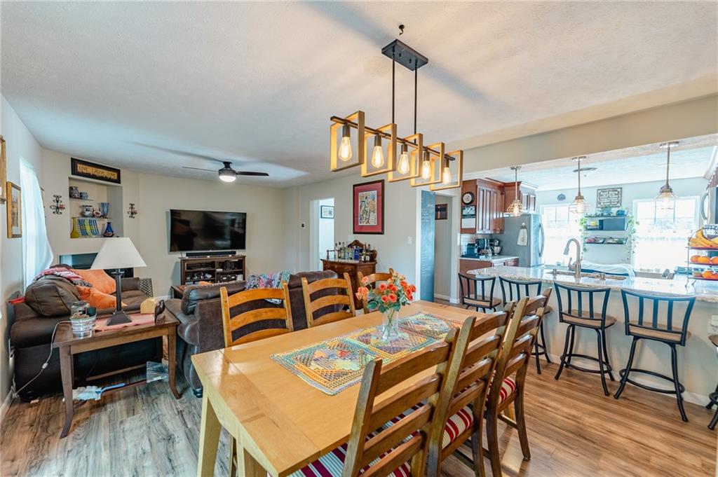 120 Lockheed Drive Coraopolis, PA 15108 - Photo 8 of 31 a view of a dining room with furniture window and wooden floor