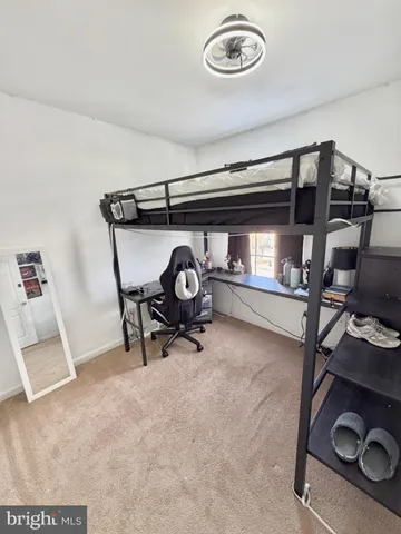 a view of a room with windows