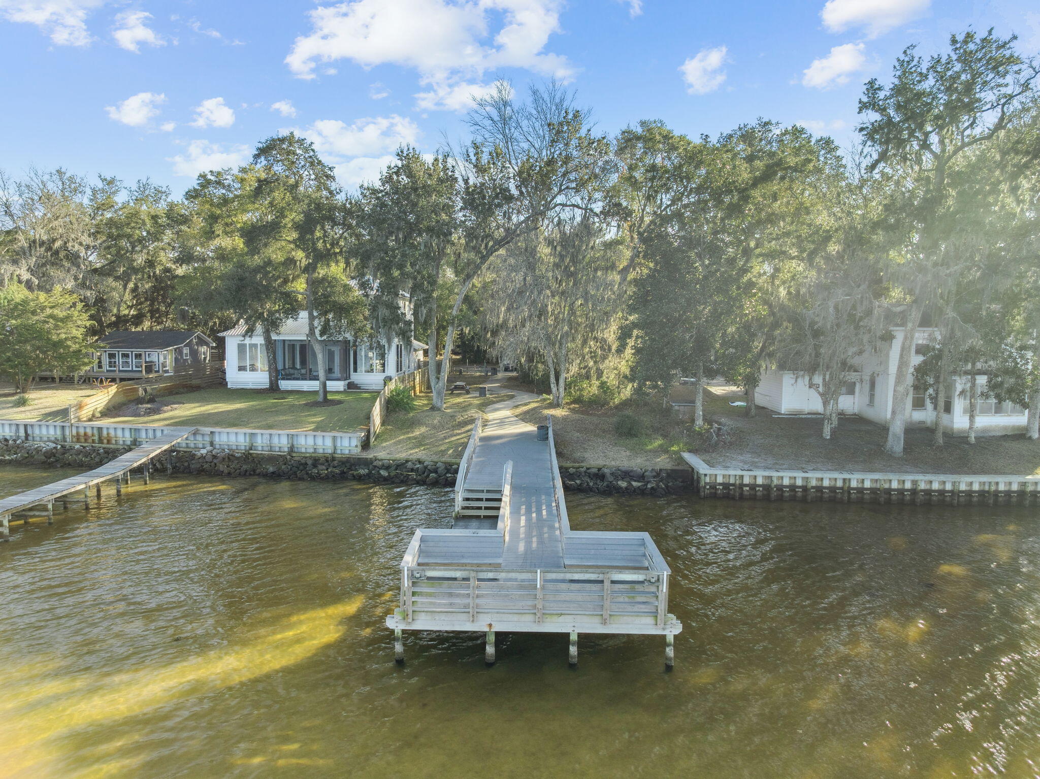 Lot D16 Oak Ave Point Santa Rosa Beach, FL 32459 - Photo 6 of 8 a view of a lake with a house in the background