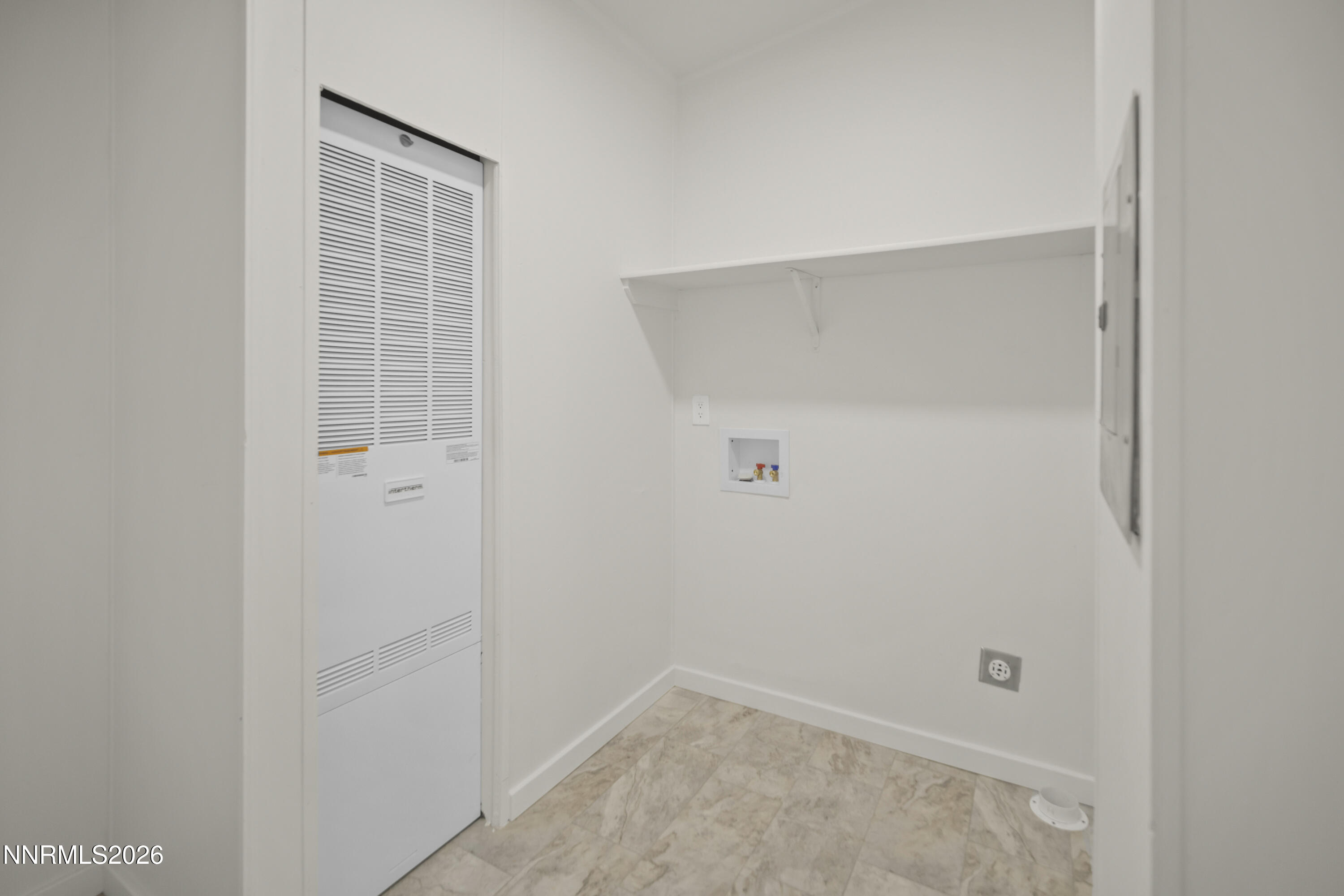 3225 Antelope Street Silver Springs, NV 89429 - Photo 26 of 39 an empty room with windows