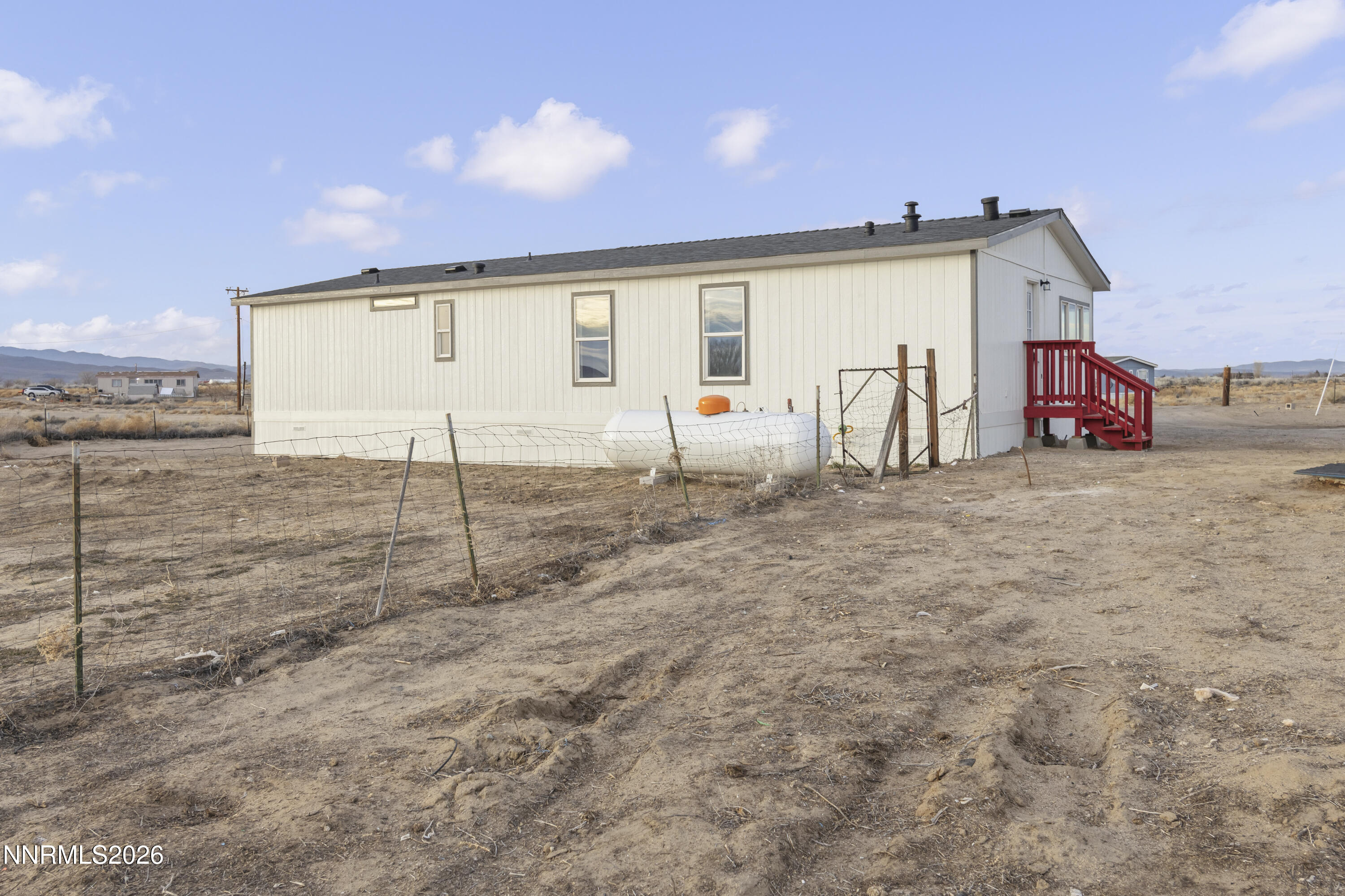 3225 Antelope Street Silver Springs, NV 89429 - Photo 31 of 39 a view of a house with backyard