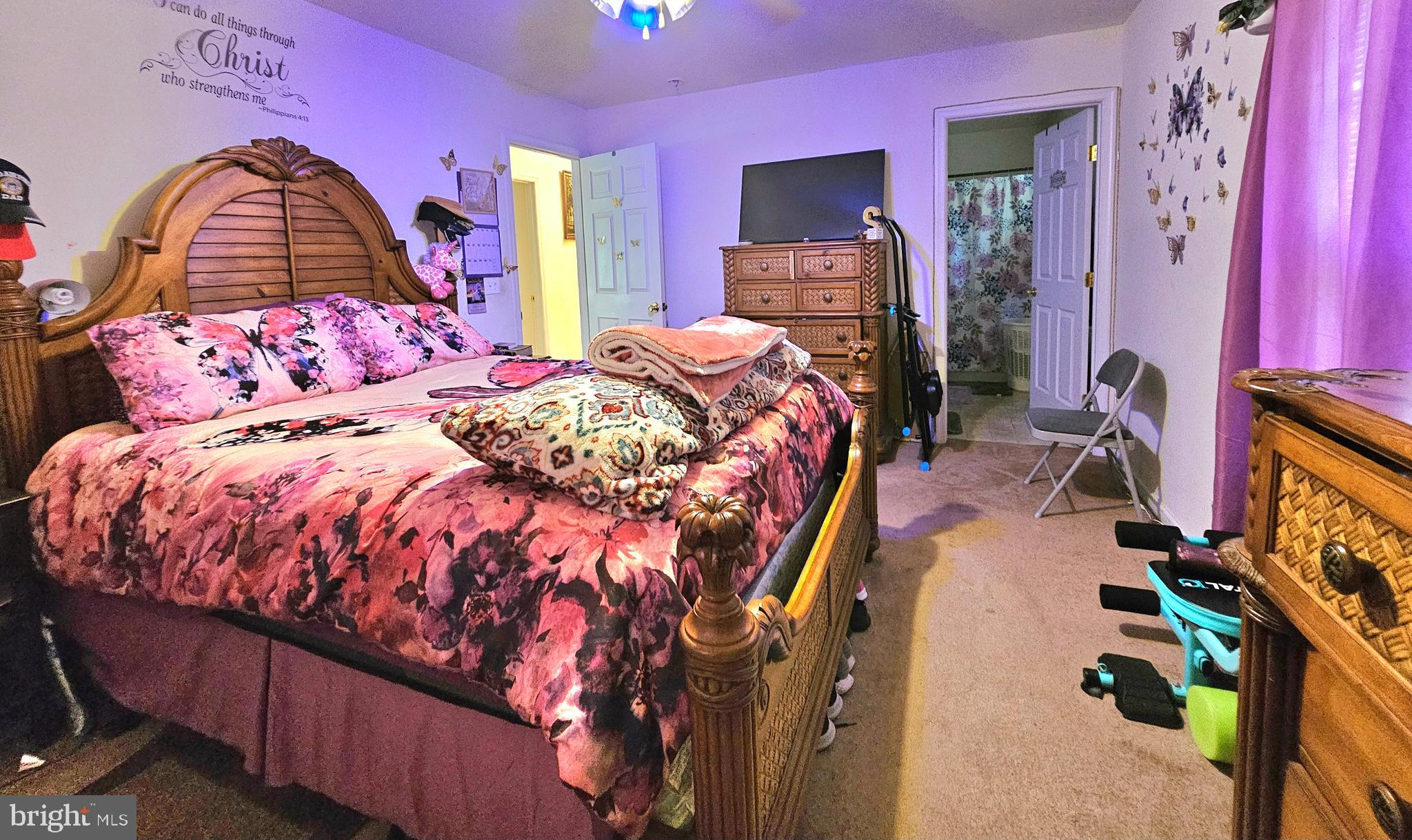 8339 Upper Hill Road Westover, MD 21871 - Photo 11 of 20 a bedroom with a bed and dresser with mirror