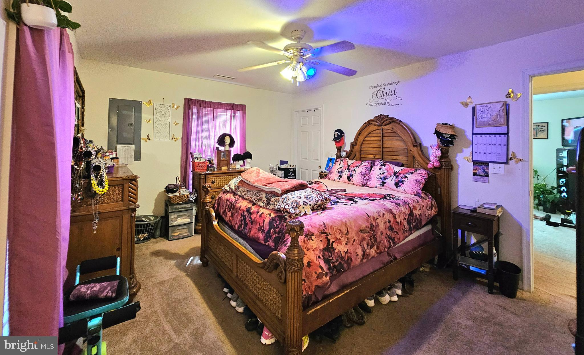 8339 Upper Hill Road Westover, MD 21871 - Photo 12 of 20 a bed room with a bed and a chandelier