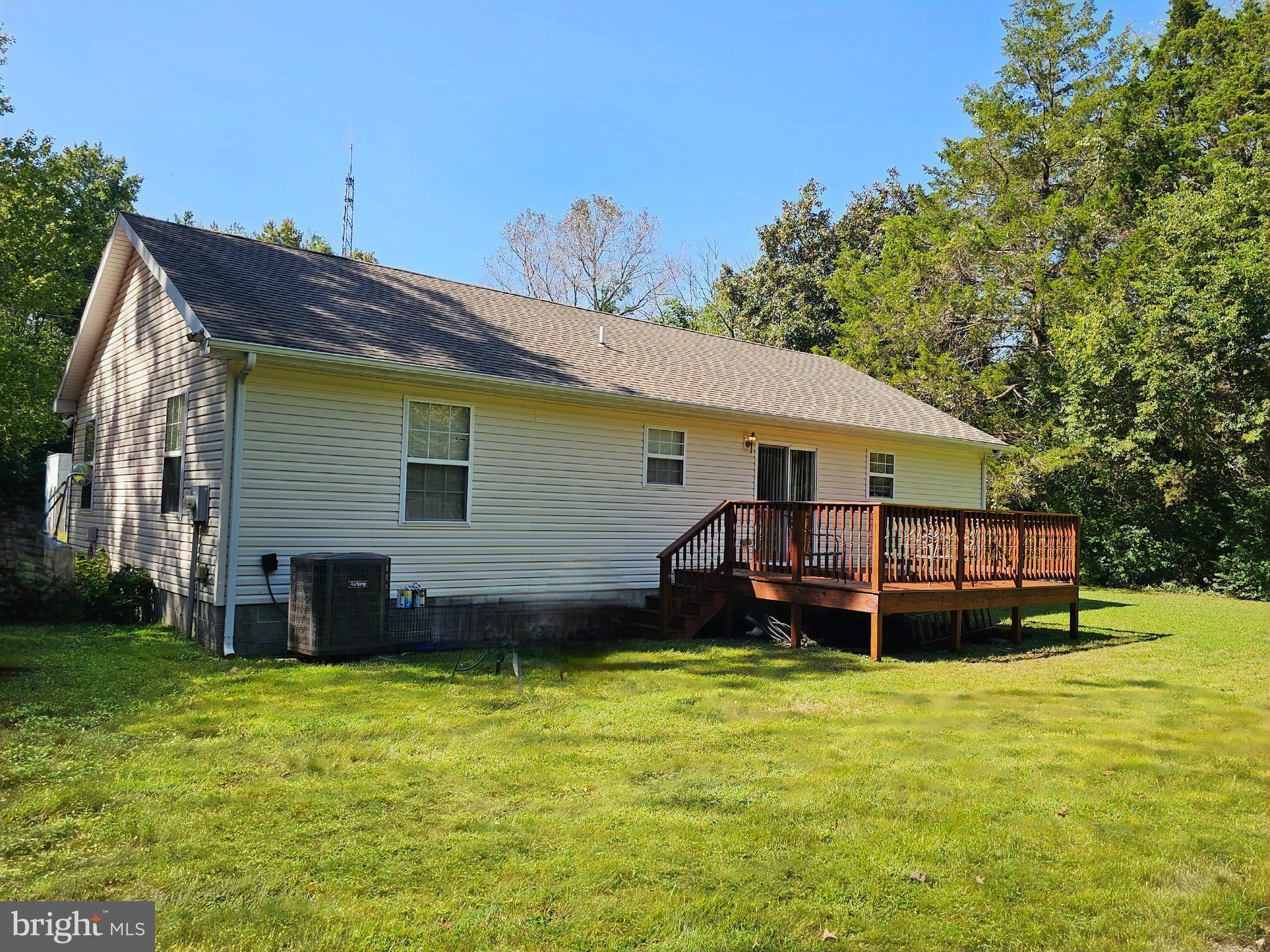 8339 Upper Hill Road Westover, MD 21871 - Photo 16 of 20 a view of a house with a backyard