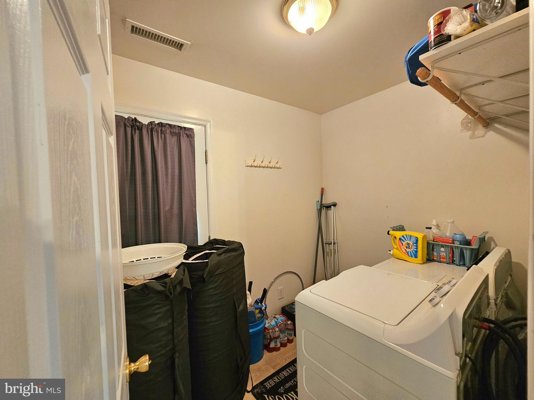 8339 Upper Hill Road Westover, MD 21871 - Photo 6 of 20 a utility room with dryer and washer