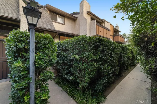 a house view with a outdoor space