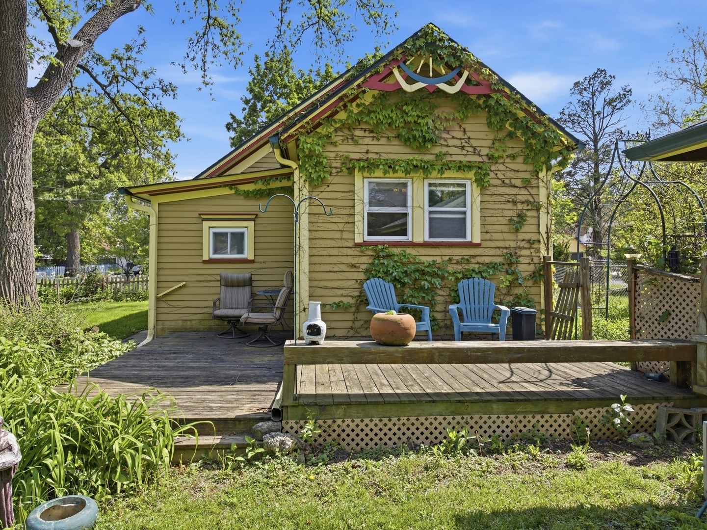 570 Addison Street Elgin, IL 60120 - Photo 9 of 17 a front view of a house with garden