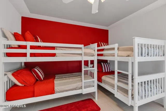 a bathroom with a sink vanity granite and a mirror