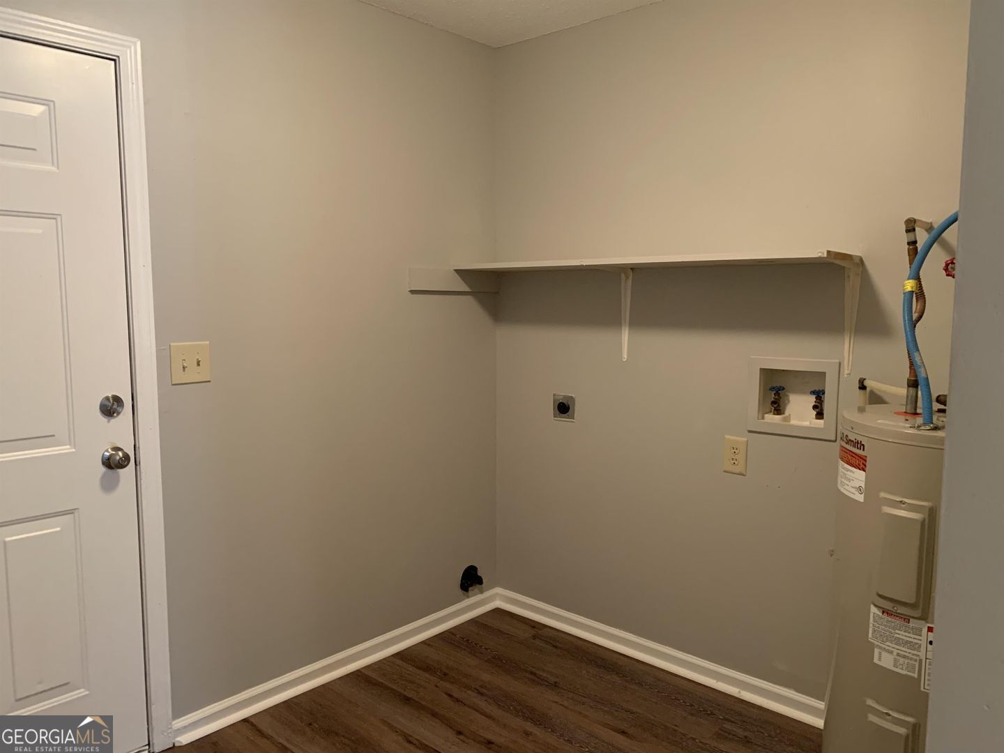 708 Green Street, Unit B Fort Valley, GA 31030 - Photo 12 of 12 a view of small space with racks on the wall