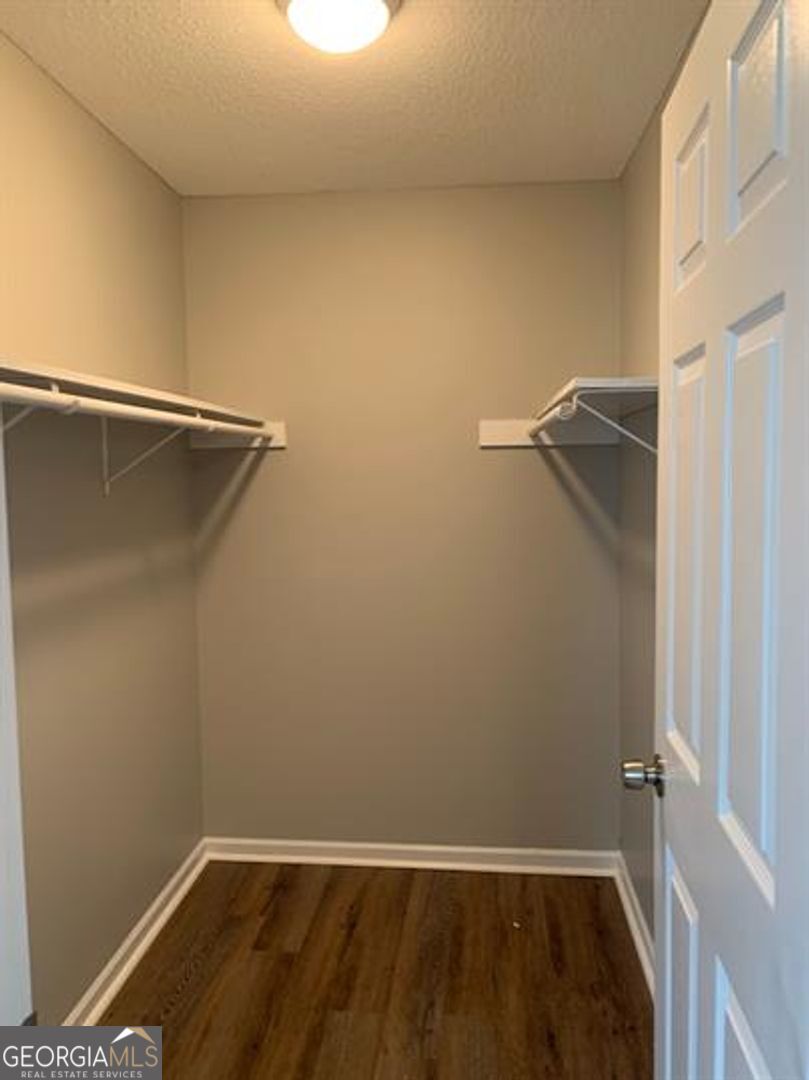 708 Green Street, Unit B Fort Valley, GA 31030 - Photo 7 of 12 a view of a room with wooden floor