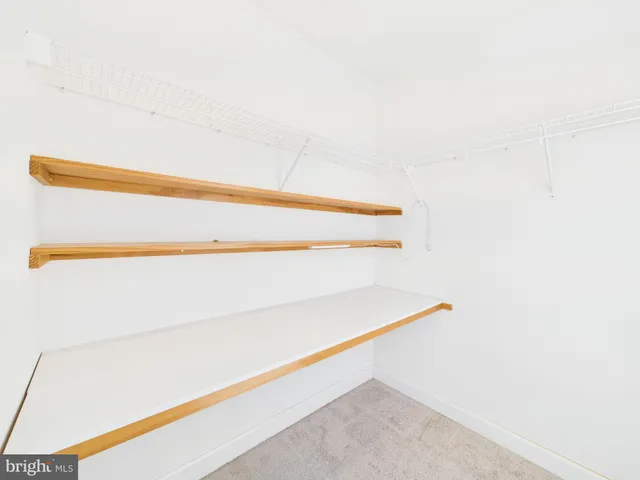 a view of a workspace with furniture