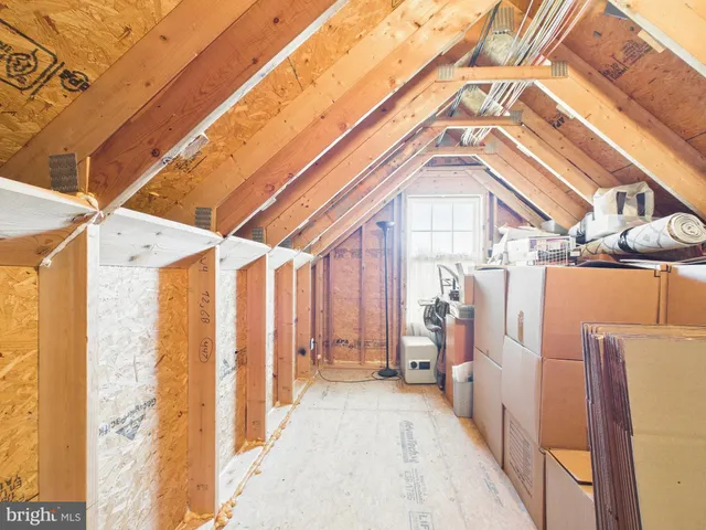 a view of a livingroom with furniture and a flat screen tv