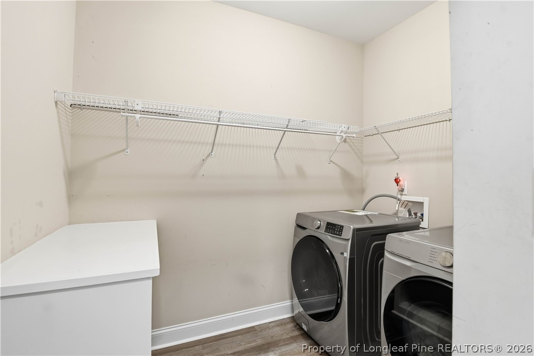 140 Birch Avenue Spring Lake, NC 28390 - Photo 27 of 49 a utility room with dryer and washer