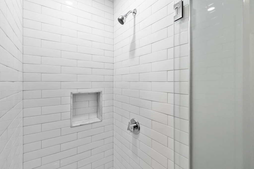 51 Mansfield Street, Unit 51 Everett, MA 02149 - Photo 16 of 19 a bathroom with a shower