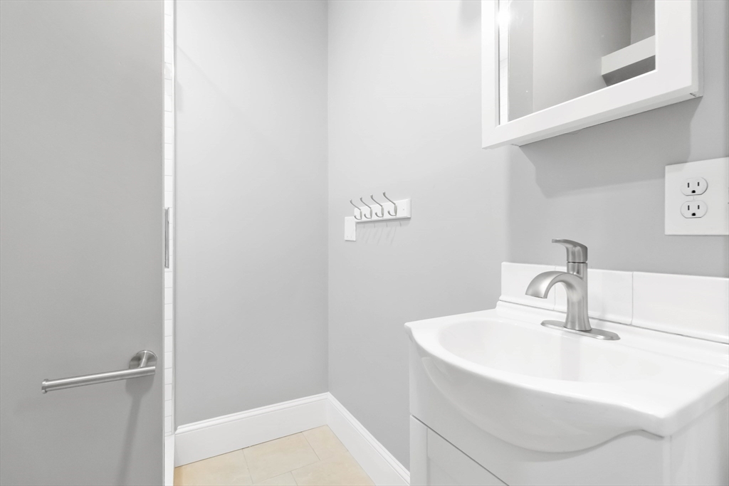 51 Mansfield Street, Unit 51 Everett, MA 02149 - Photo 16 of 19 a bathroom with a sink