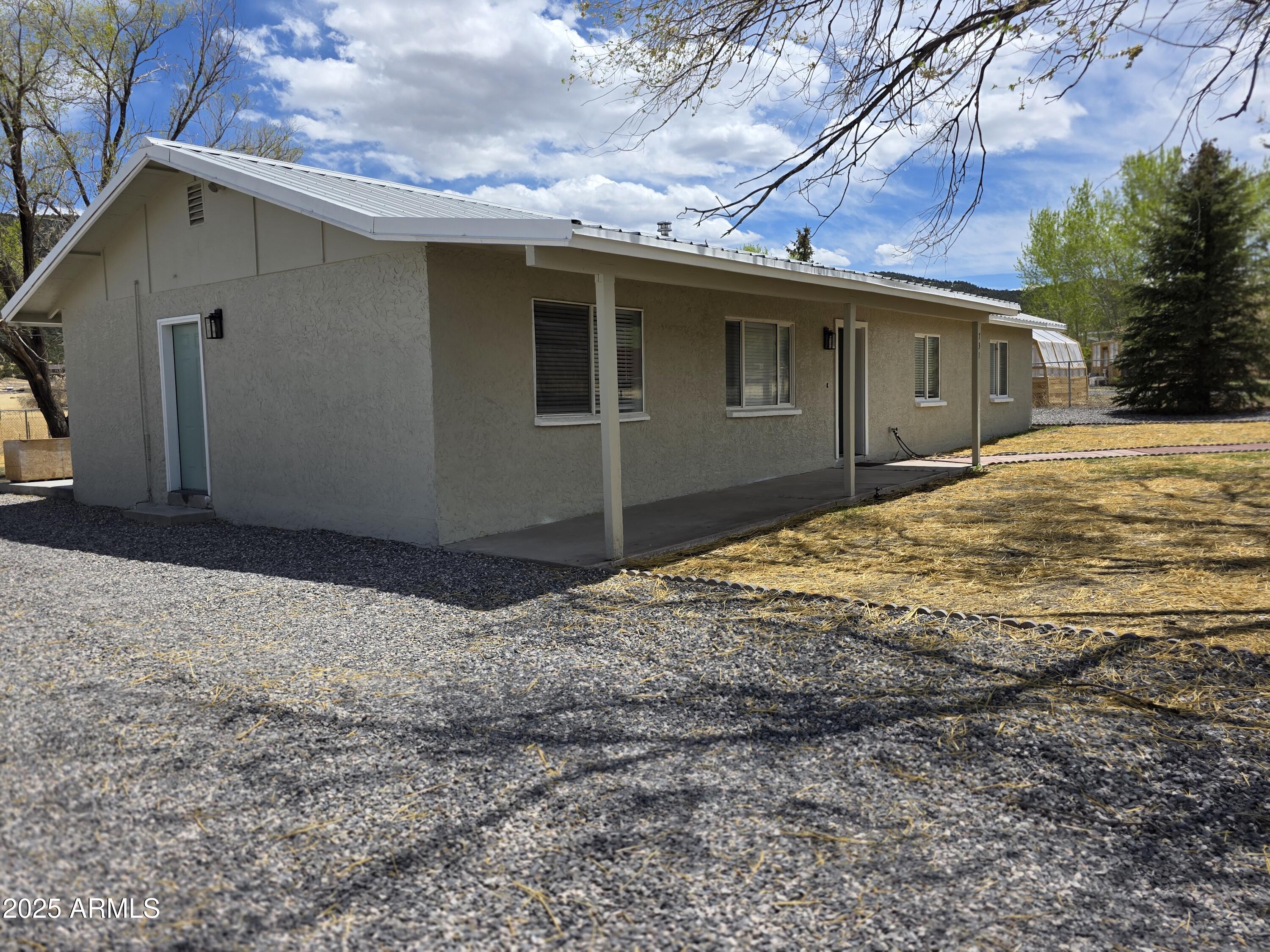 731 Elm Lane Eagar, AZ 85925 - Photo 5 of 26 a backyard of a house