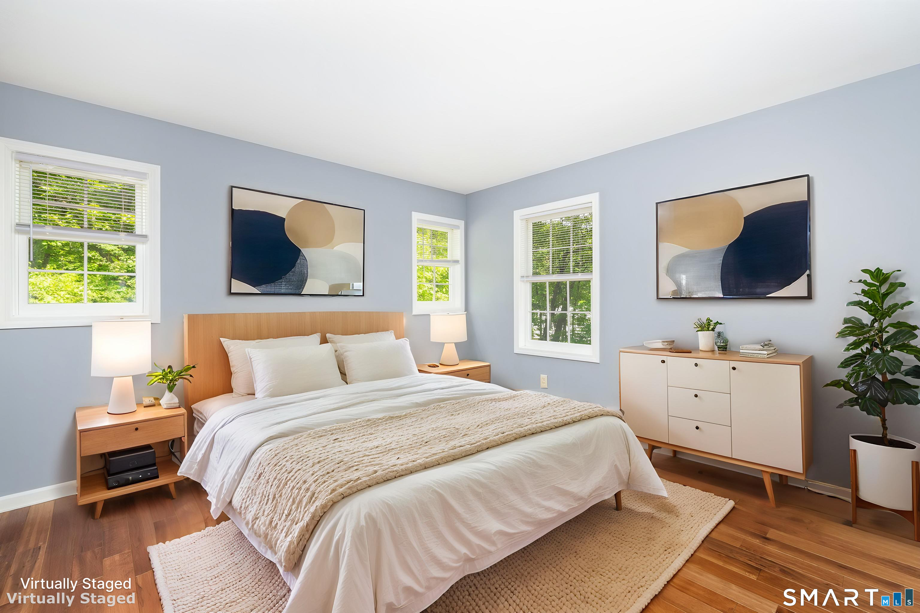 175 Vernon Street Manchester, CT 06042 - Photo 13 of 38 a bedroom with a bed and a flat screen tv