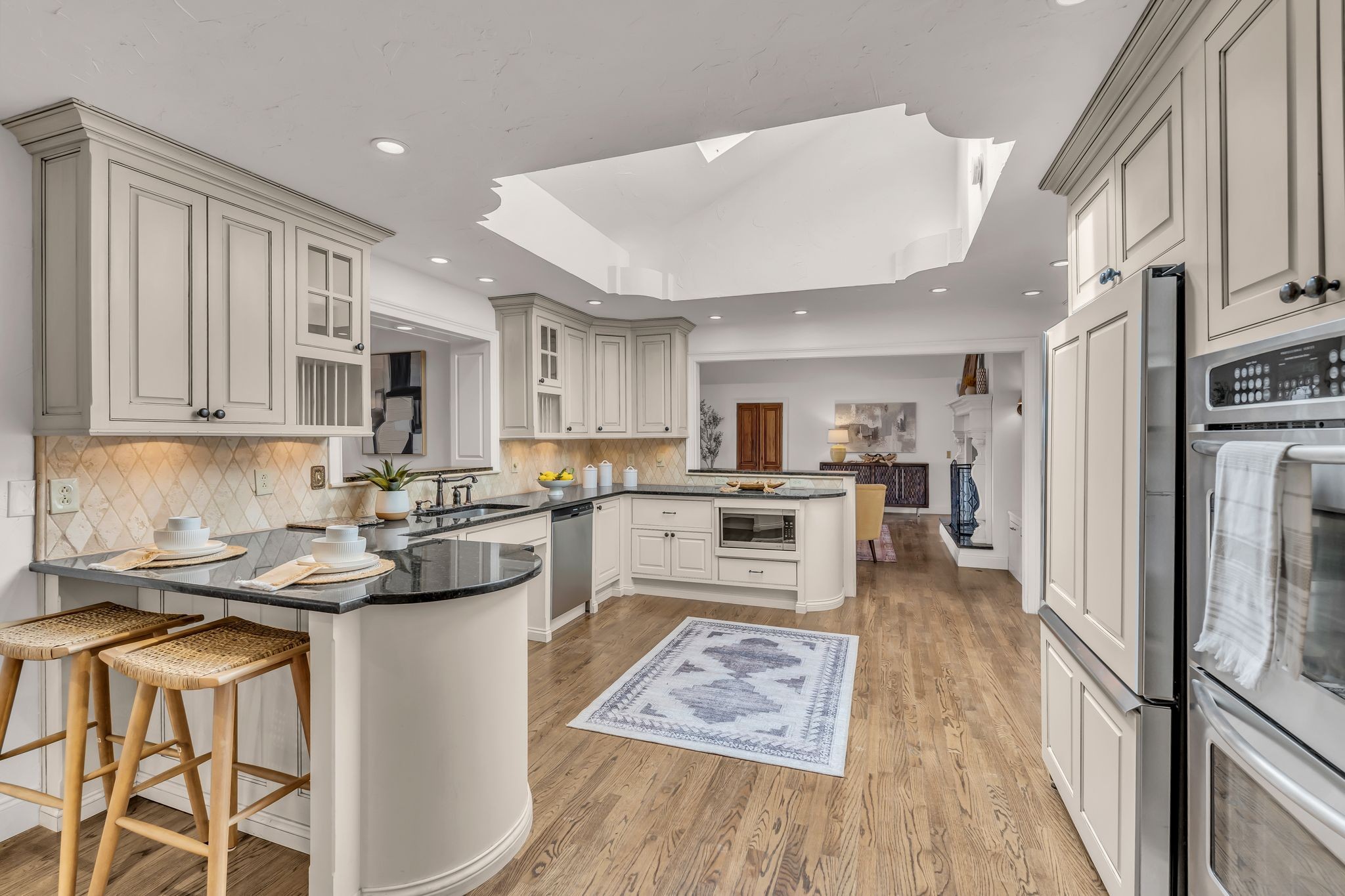 6307 Ramsgate Court Brentwood, TN 37027 - Photo 17 of 99 a kitchen with stainless steel appliances granite countertop a refrigerator sink and stove