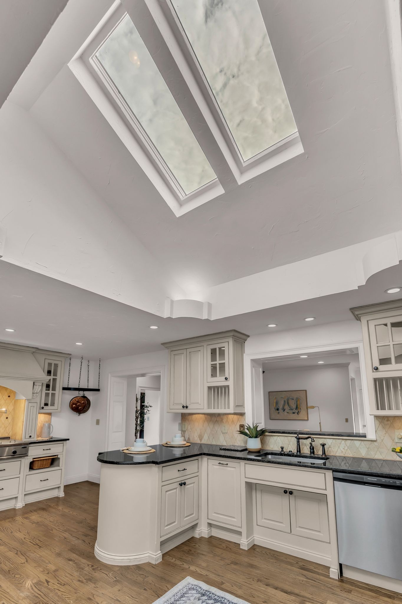 6307 Ramsgate Court Brentwood, TN 37027 - Photo 21 of 99 a kitchen with stainless steel appliances granite countertop a sink and cabinets