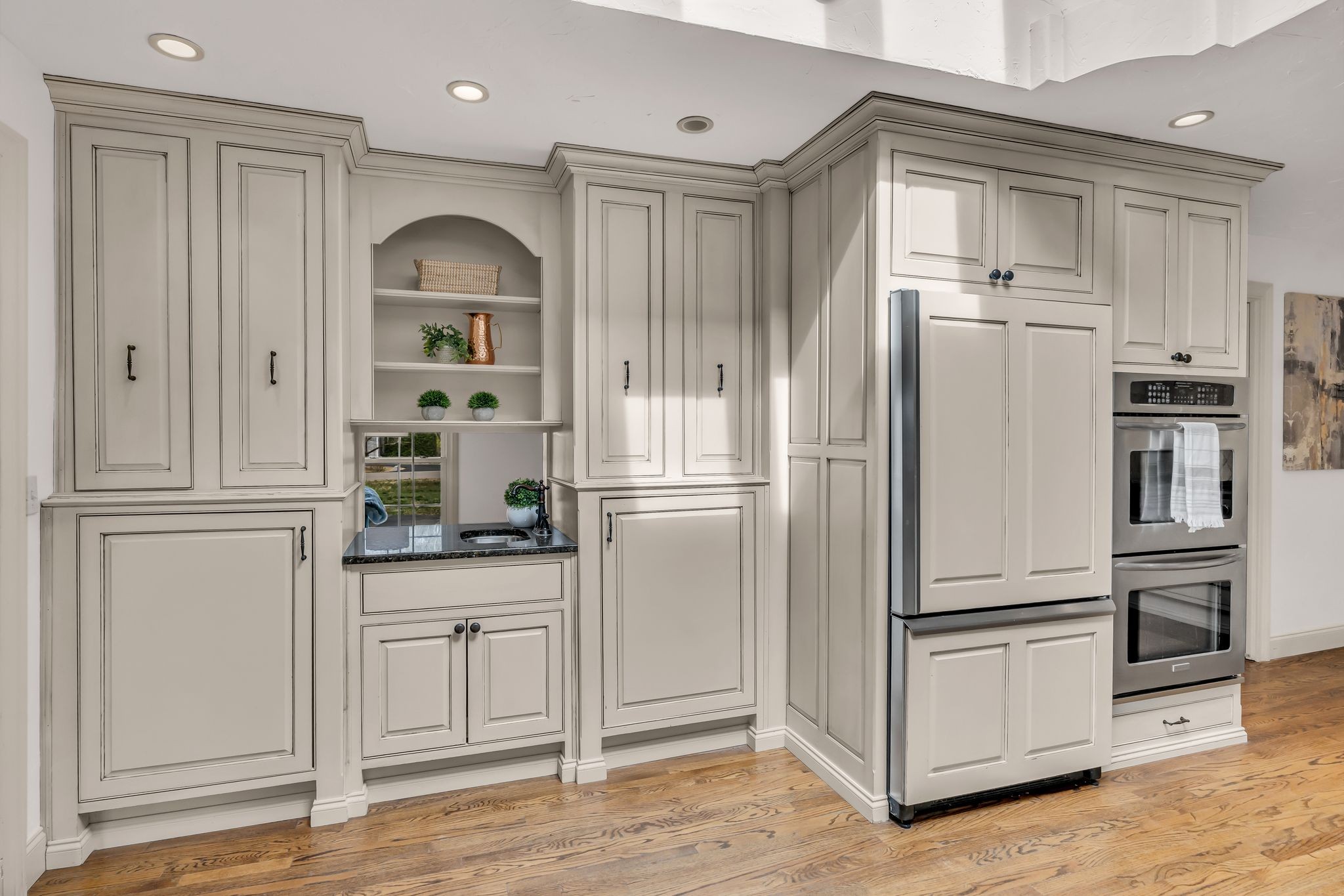 6307 Ramsgate Court Brentwood, TN 37027 - Photo 22 of 99 a kitchen with granite countertop stainless steel appliances a refrigerator and cabinets