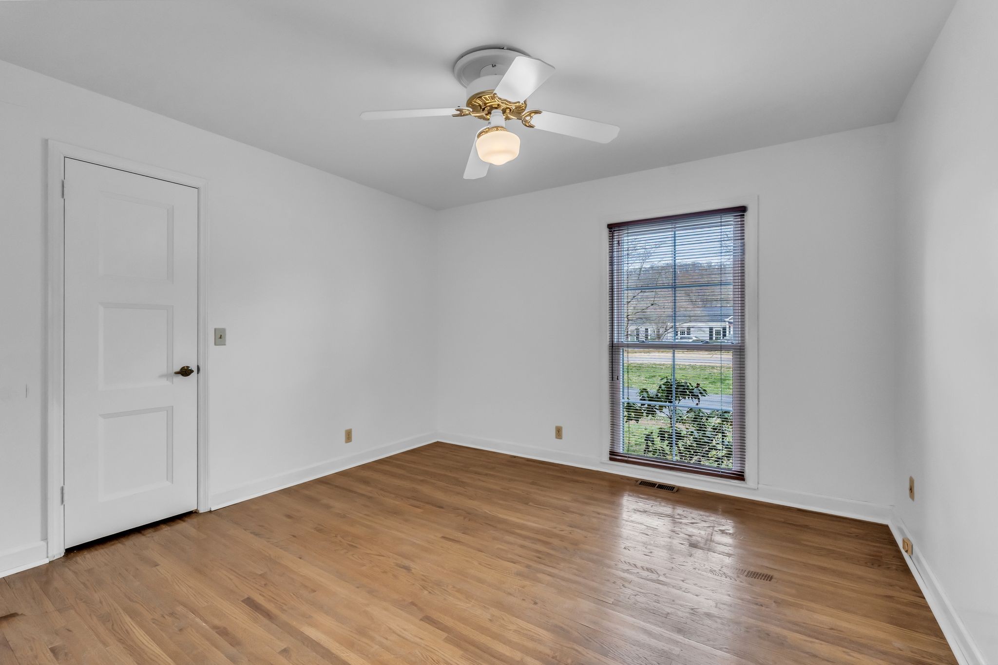 6307 Ramsgate Court Brentwood, TN 37027 - Photo 32 of 99 wooden floor in an empty room with a window