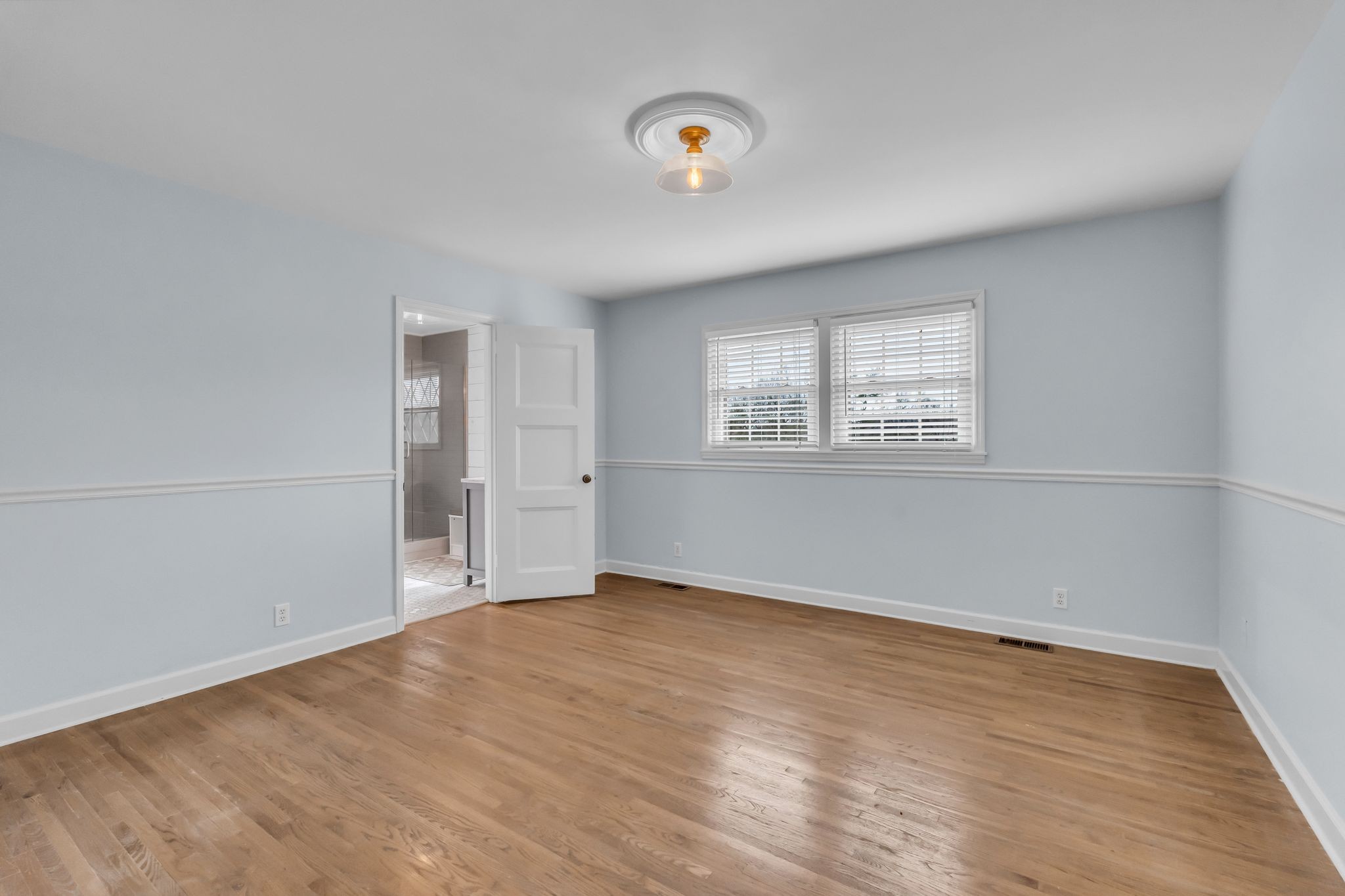 6307 Ramsgate Court Brentwood, TN 37027 - Photo 33 of 99 an empty room with wooden floor and windows