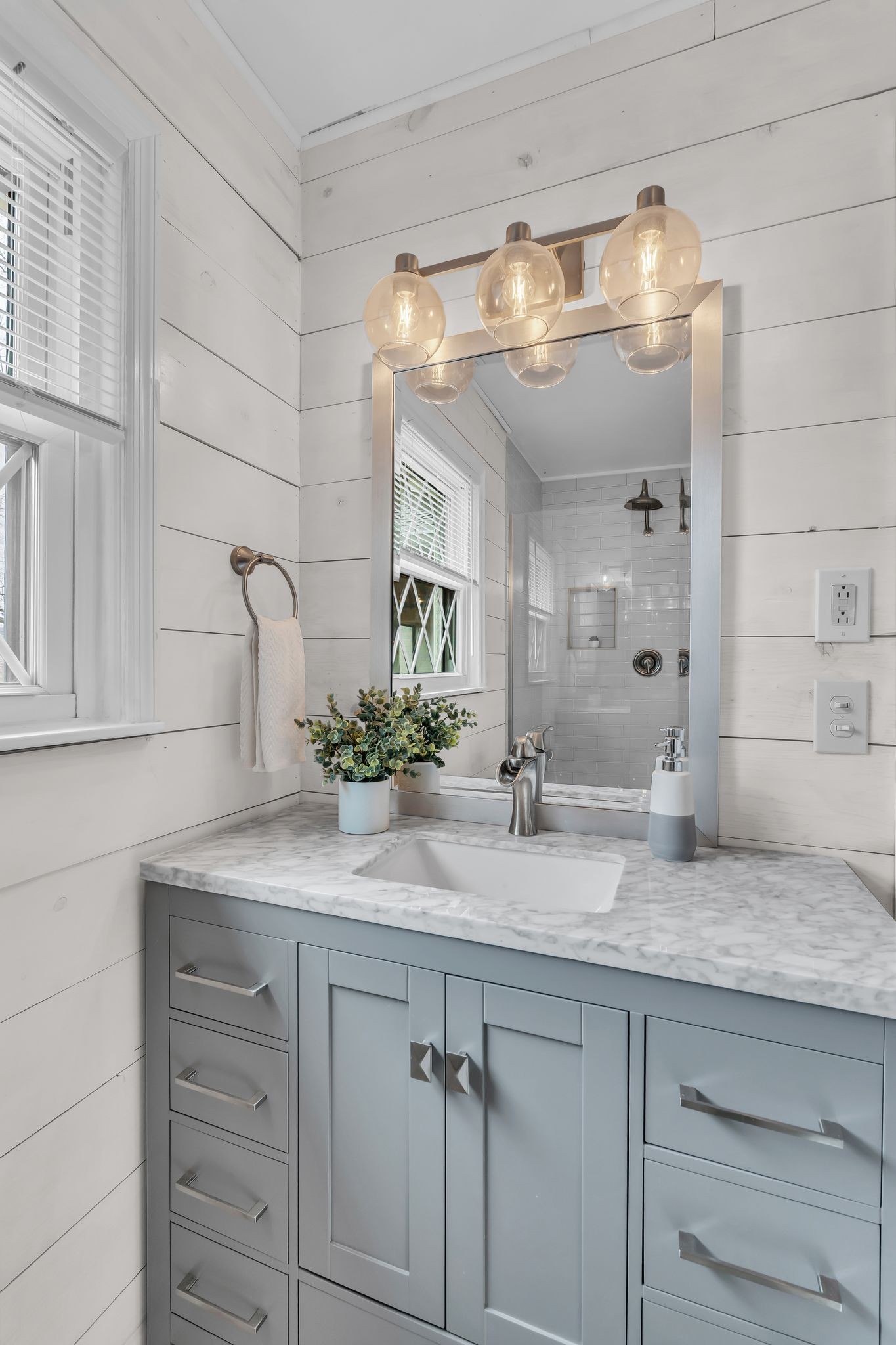 6307 Ramsgate Court Brentwood, TN 37027 - Photo 36 of 99 a bathroom with a granite countertop sink a mirror and vanity