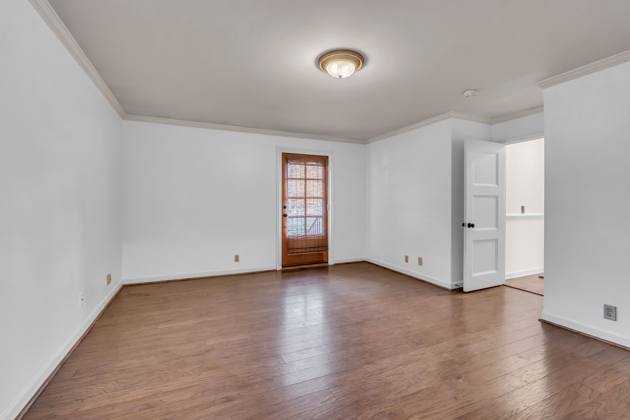 6307 Ramsgate Court Brentwood, TN 37027 - Photo 38 of 99 an empty room with wooden floor and window