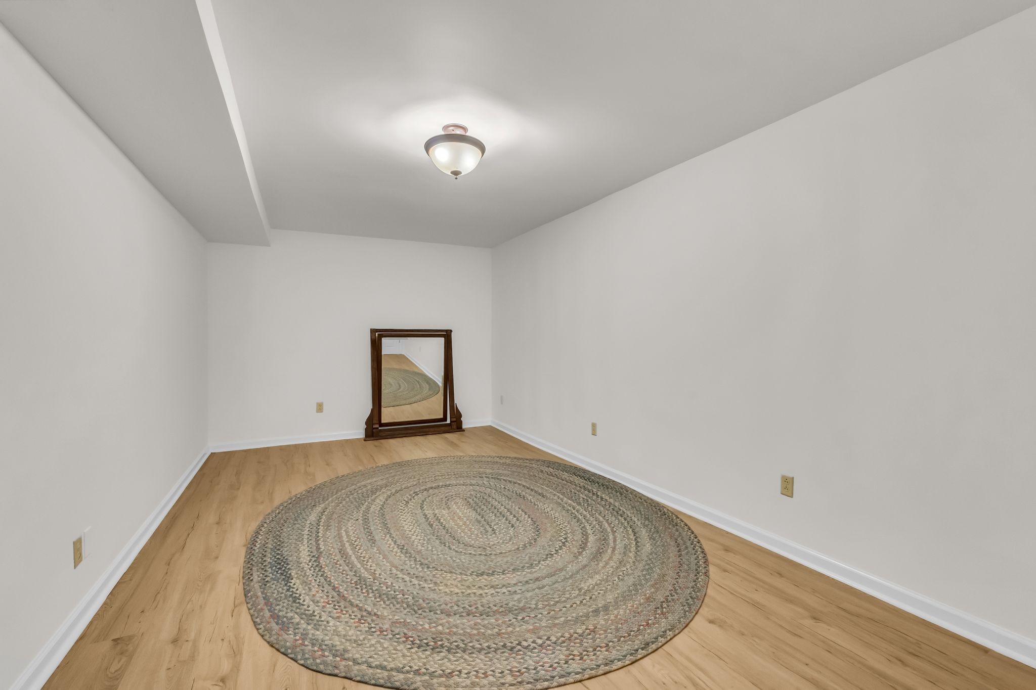 6307 Ramsgate Court Brentwood, TN 37027 - Photo 68 of 99 a view of a room with wooden floor and fan