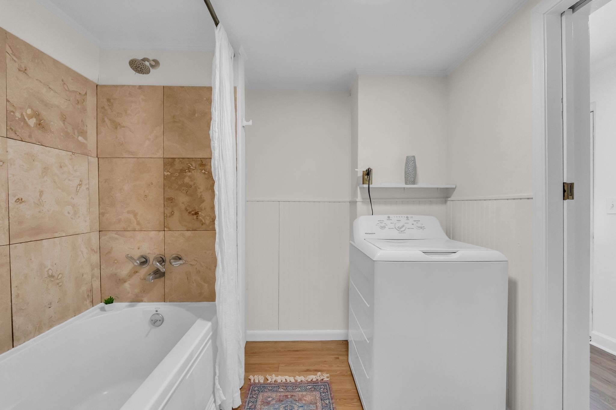 6307 Ramsgate Court Brentwood, TN 37027 - Photo 72 of 99 a bathroom with a tub a sink and a shower