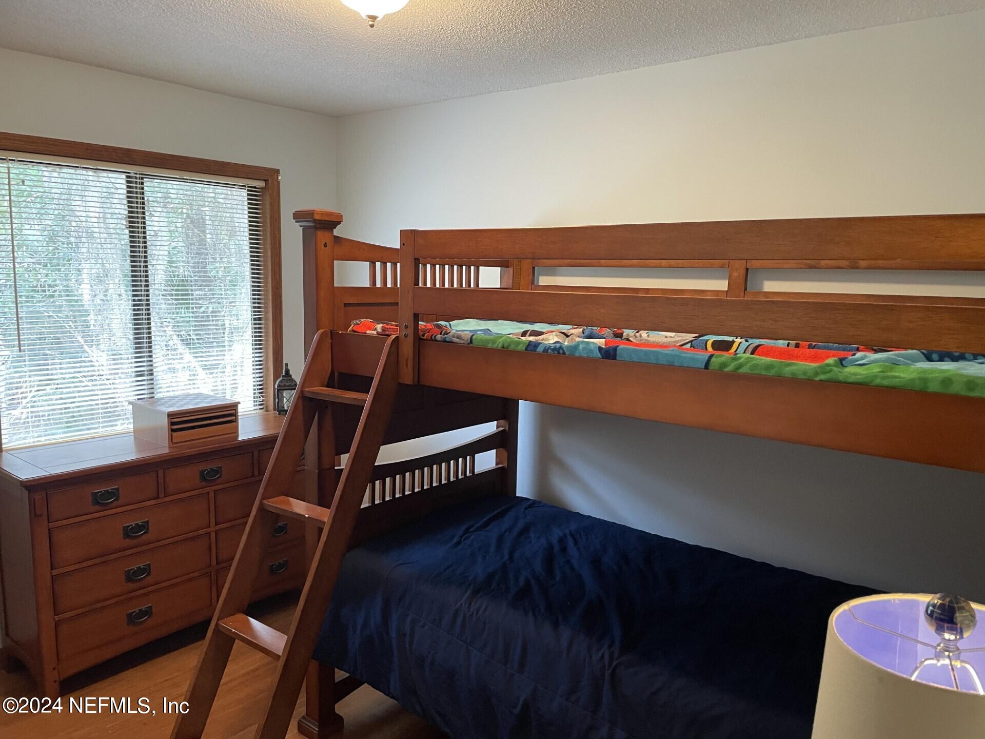 110 North Point Drive Georgetown, FL 32139 - Photo 17 of 28 a room with furniture and window