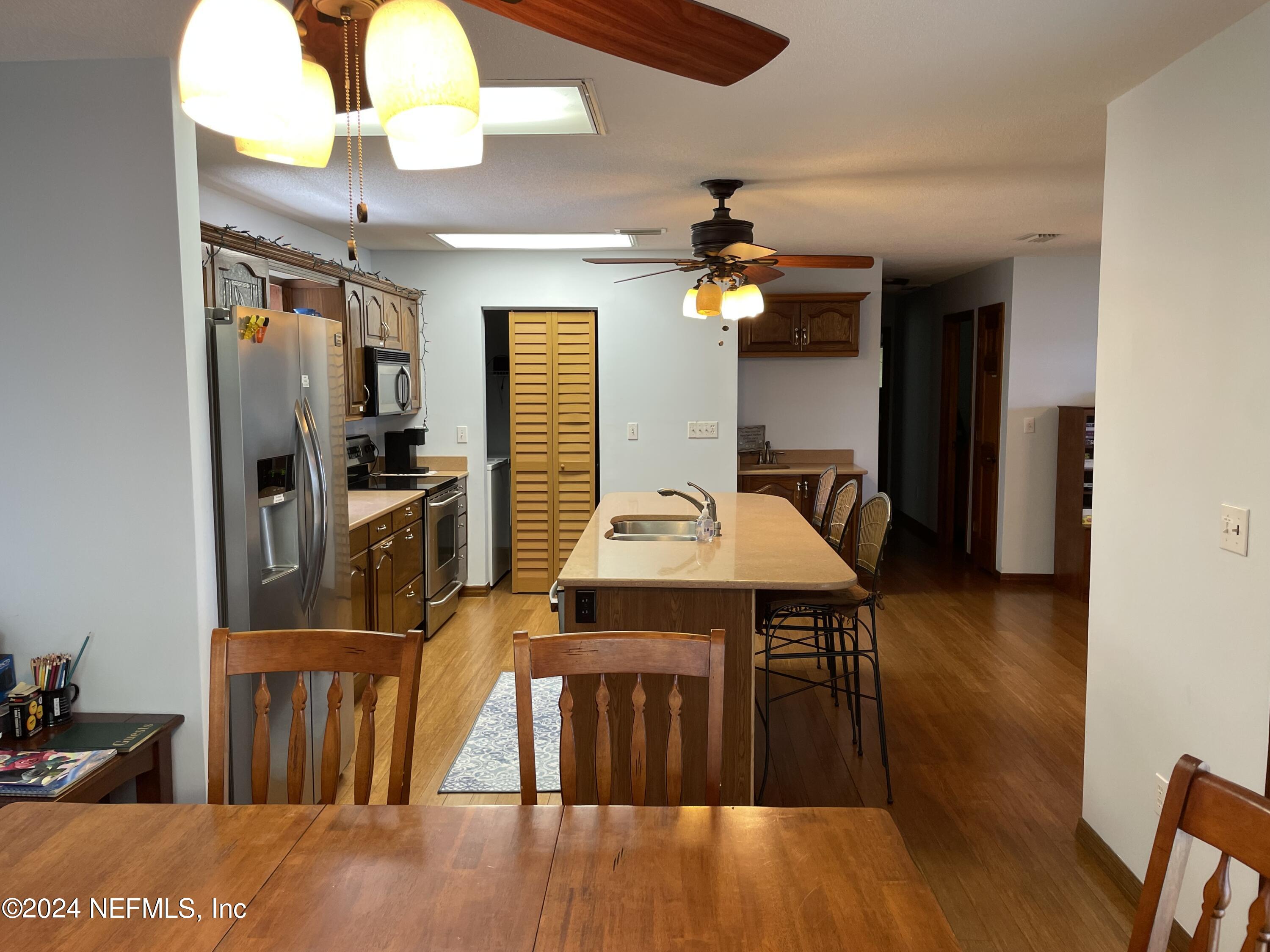 110 North Point Drive Georgetown, FL 32139 - Photo 9 of 28 a dinning area with furniture and wooden floor