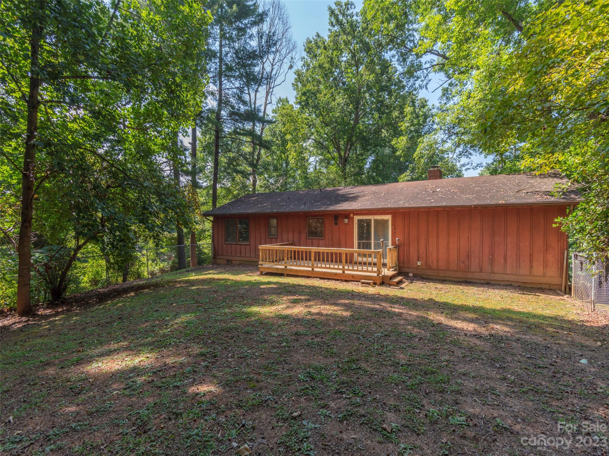 167 Paradise Circle Clyde, NC 28721 - Photo 15 of 18 a view of a house with a yard