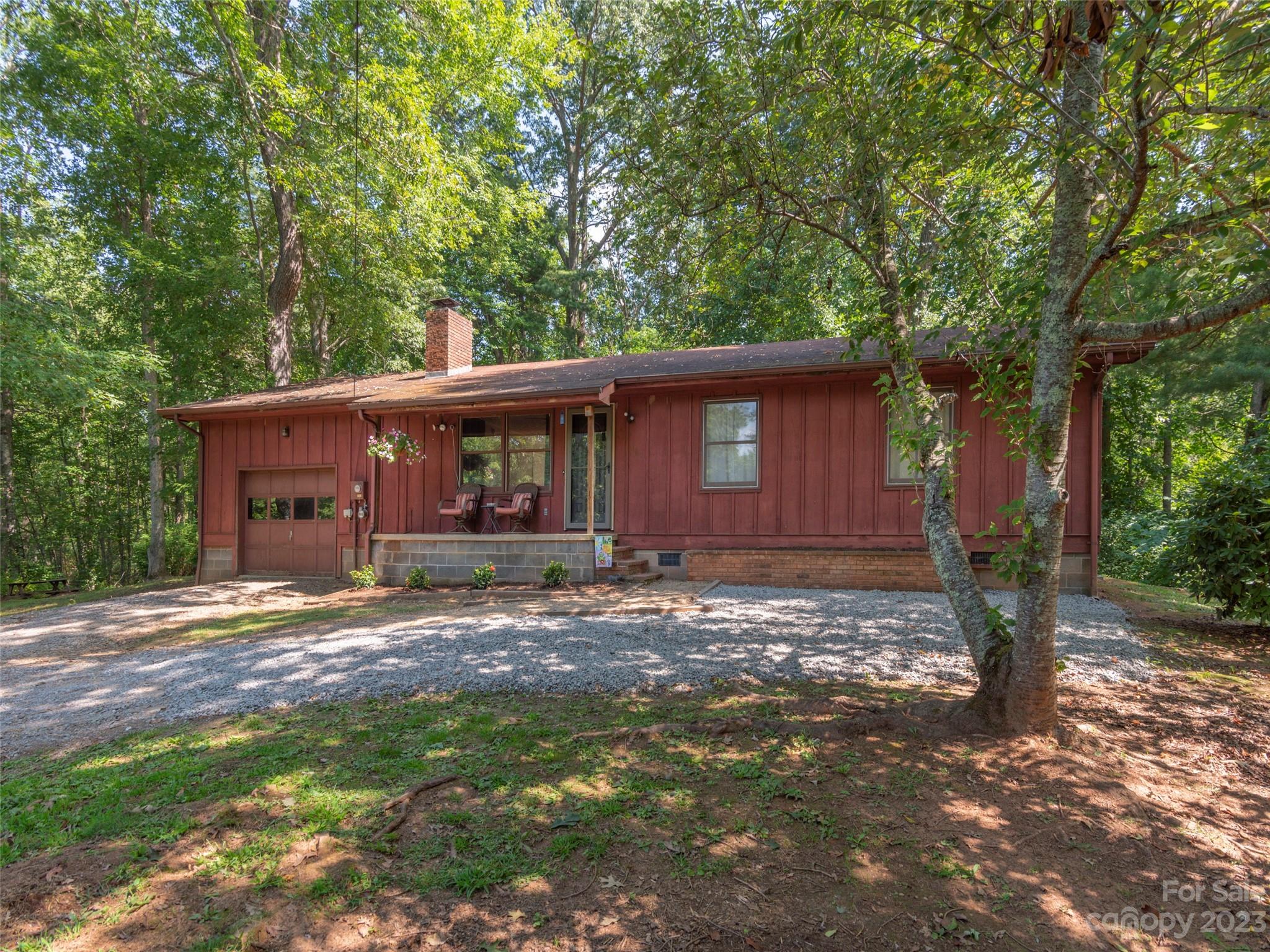 167 Paradise Circle Clyde, NC 28721 - Photo 2 of 18 a view of a house with a yard