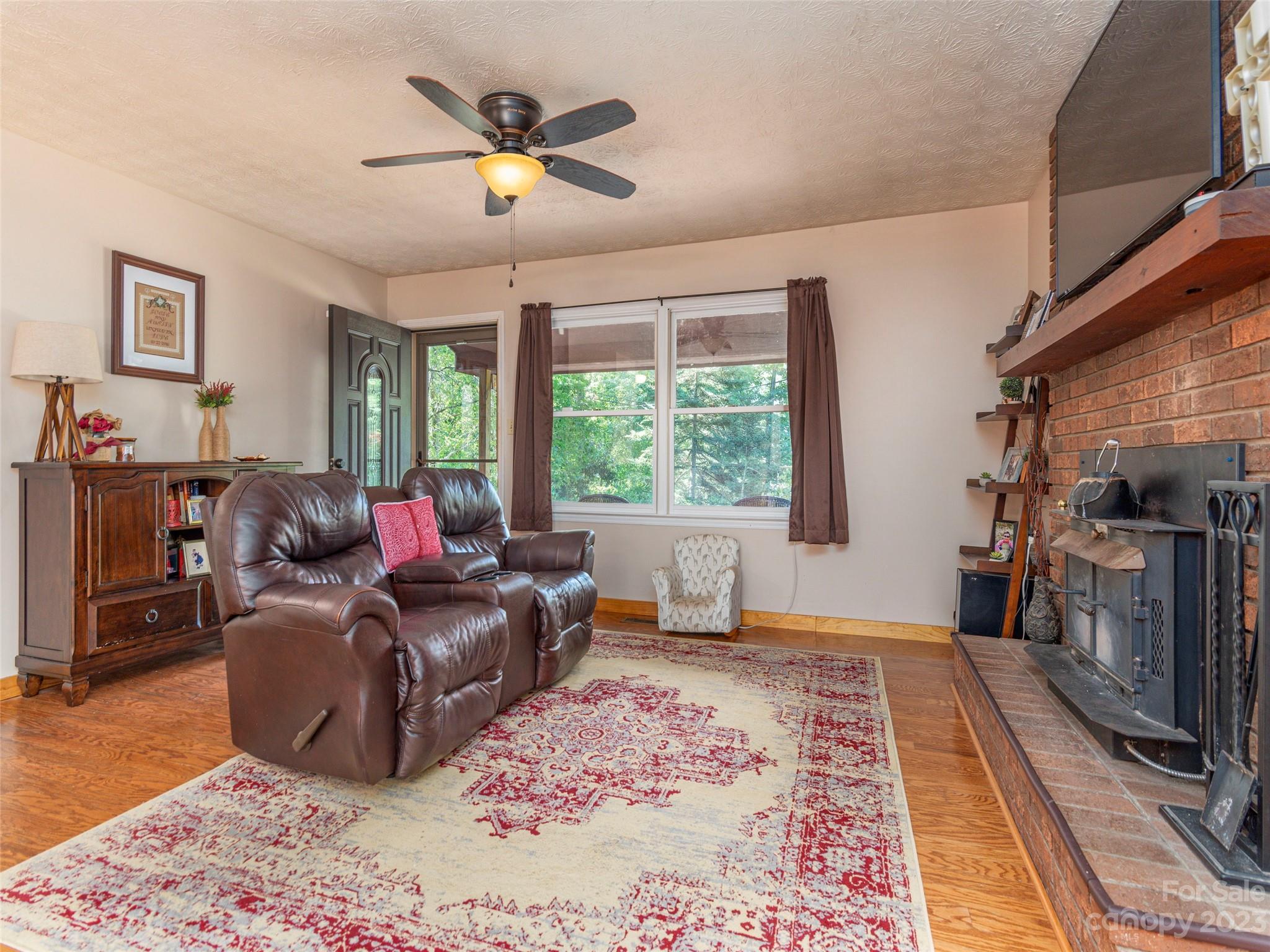 167 Paradise Circle Clyde, NC 28721 - Photo 4 of 18 a living room with furniture and a window
