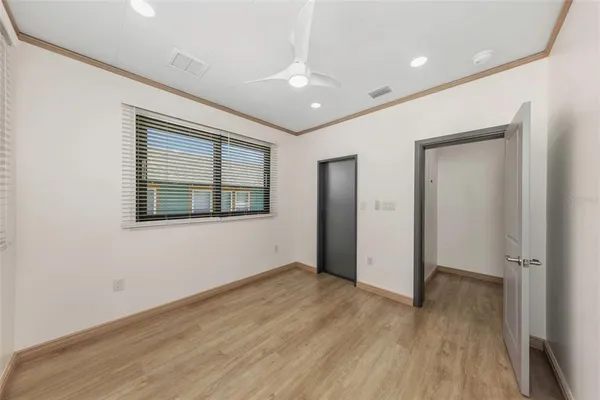 a kitchen with stainless steel appliances granite countertop a stove and a refrigerator