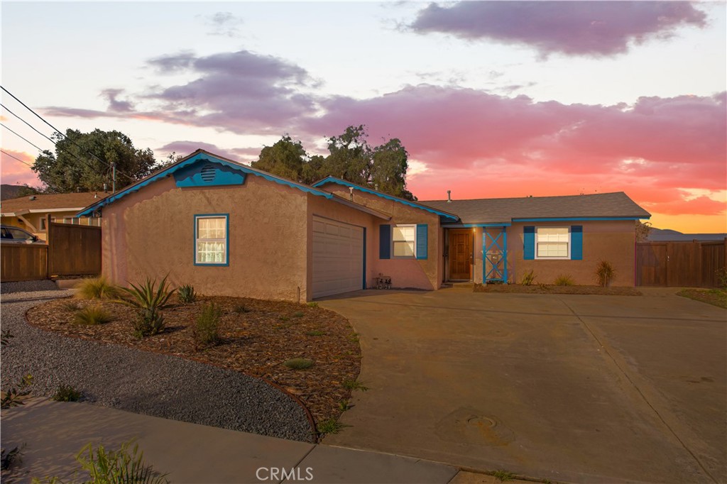 8740 Big Rock Road Santee, CA 92071 - Photo 1 of 1 a view of a house with a yard