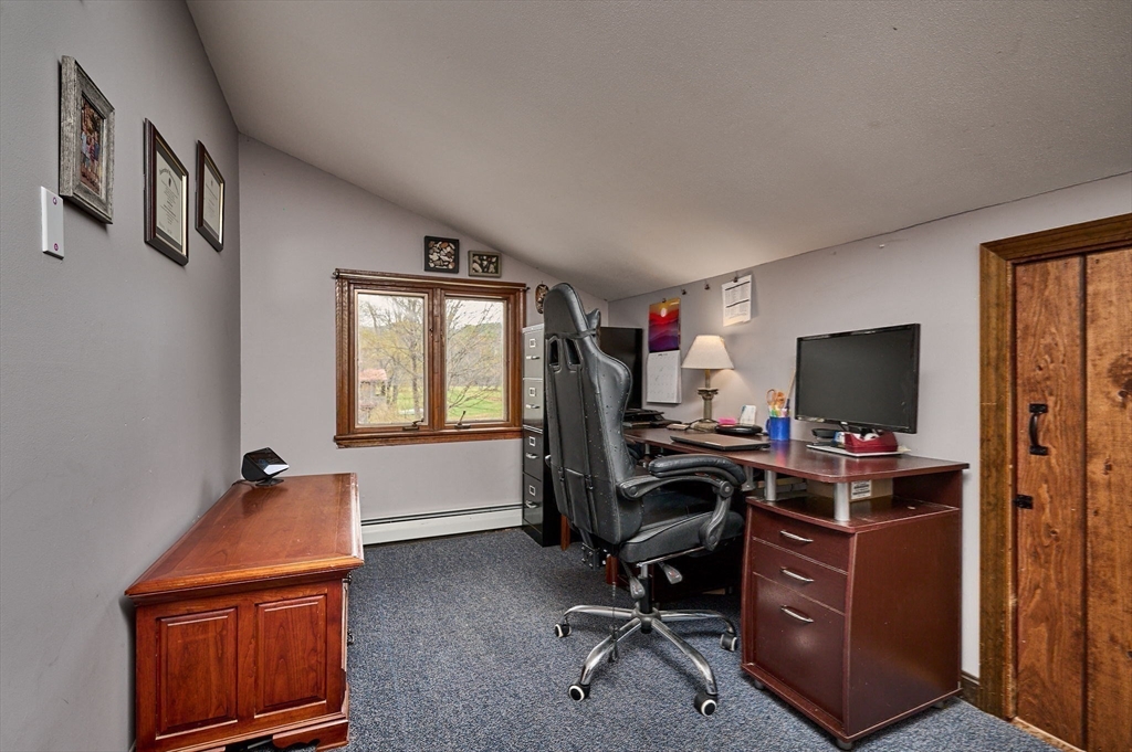 14 East Hawley Road Charlemont, MA 01339 - Photo 28 of 42 a view of a workspace with furniture and a window