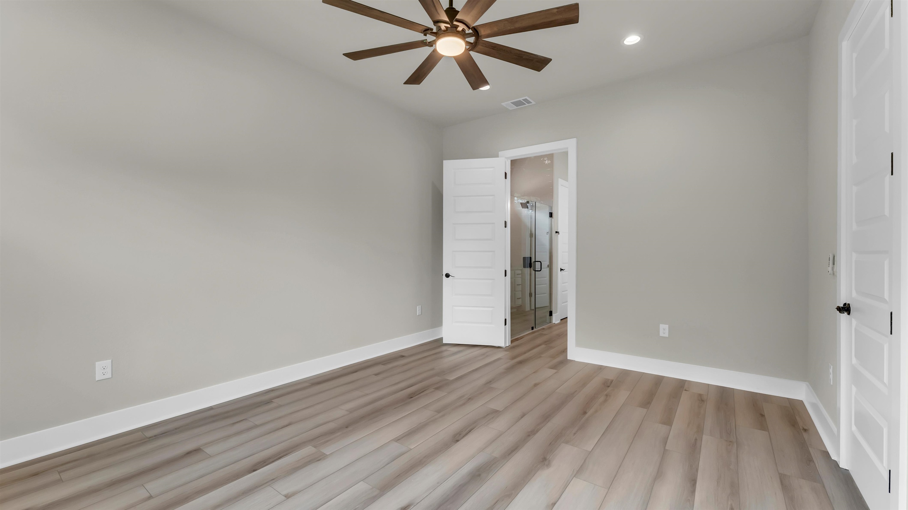 119 Garner Rnch Road Bertram, TX 78605 - Photo 12 of 25 a view of an empty room and wooden floor