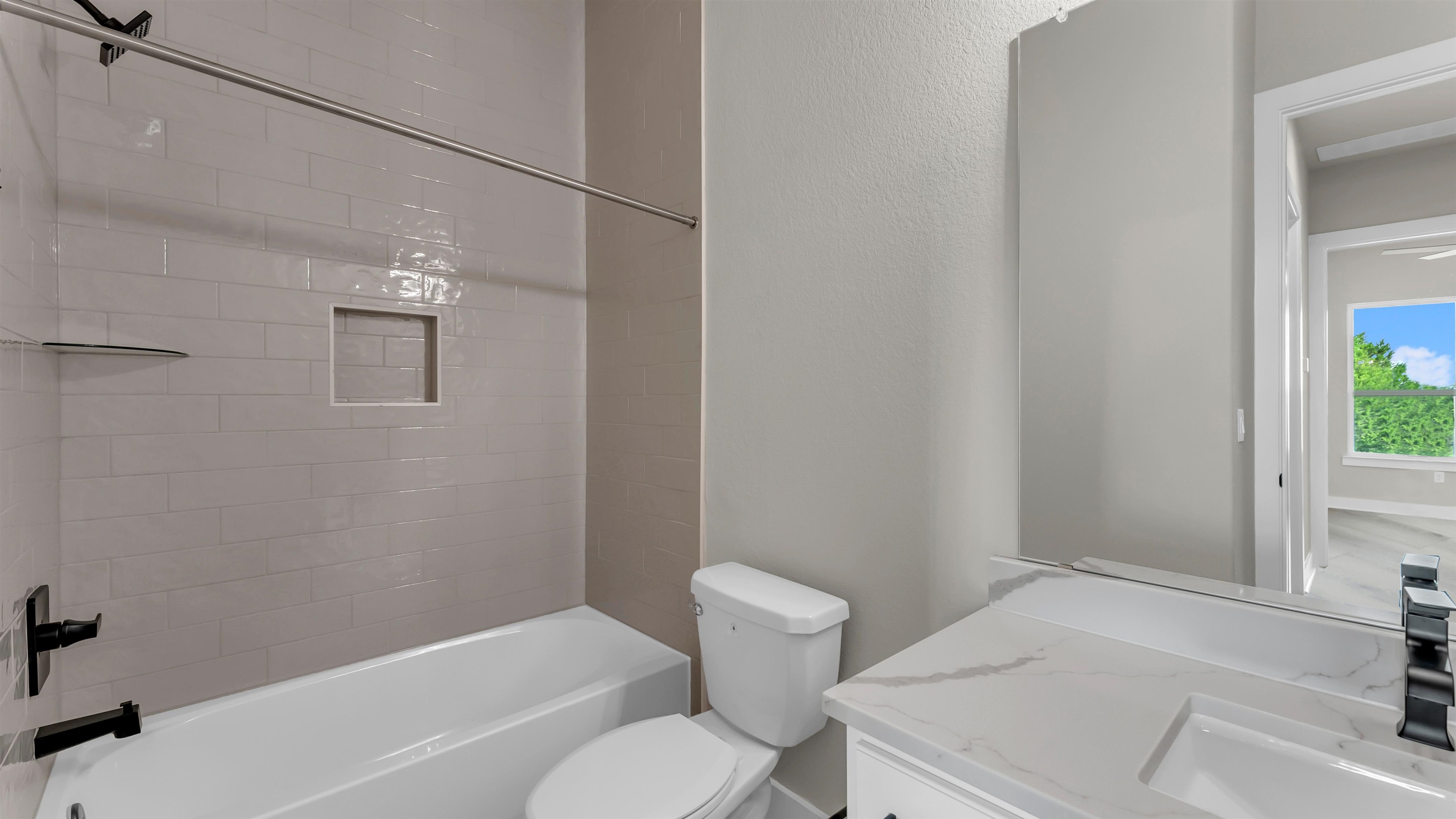 119 Garner Rnch Road Bertram, TX 78605 - Photo 16 of 25 a bathroom with a sink a toilet and shower