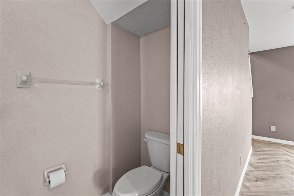 11754 Tempest Harbor Loop Venice, FL 34292 - Photo 14 of 56 a white toilet sitting next to a shower